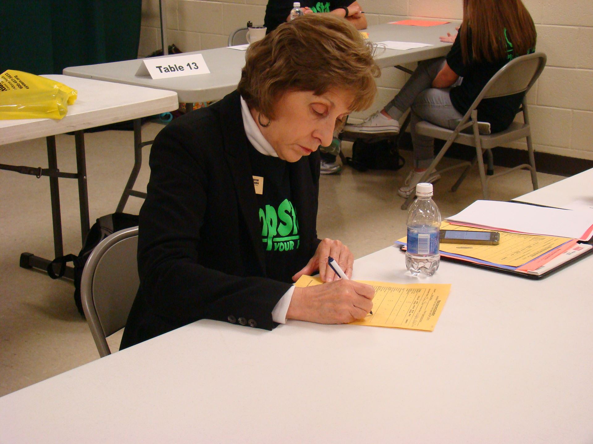 Mock interviewer prepares for next student.